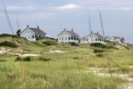 Scenic houses at coast of Bald Head Island, North Carolina.の写真素材