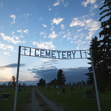 Sign over entrance to cemetary at dusk in rural South Dakota.の写真素材