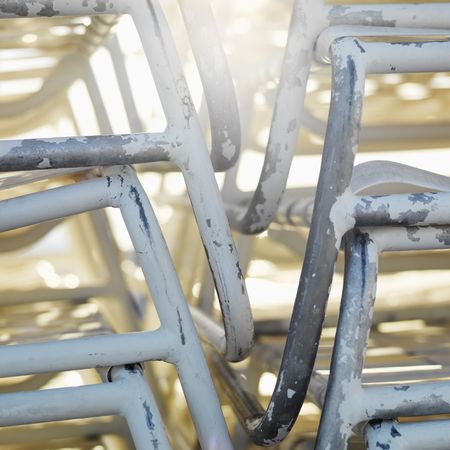 Close-up of stacked worn beach chairs in Miami, Florida, USA.の写真素材