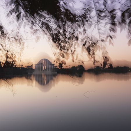 Jefferson Memorial reflected in water in Washington, D.C., USA.のeditorial素材