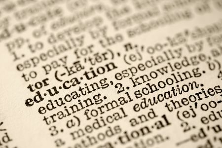 Selective focus of dictionary entry for the word education.