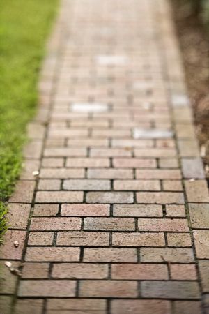 Selective focus shot of red brick walkway.の写真素材