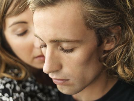 Closeup of an attractive young couple with their eyes closed. Horizontal shot.の写真素材