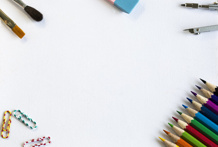 Brushes, pencils and paper clips with copyspaceの写真素材