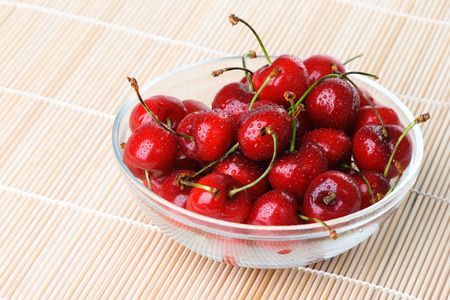 Fresh sweet cherry with a water dropsの写真素材