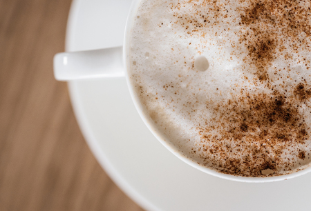 Clouse up cup of coffee on the tableの写真素材