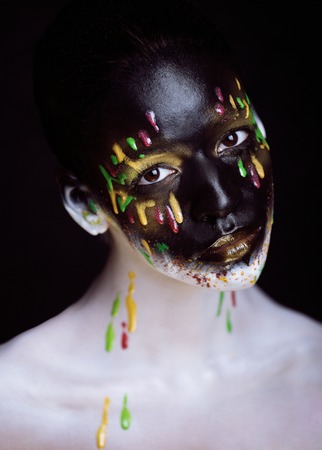 creative make up with splashes of color closeupの写真素材