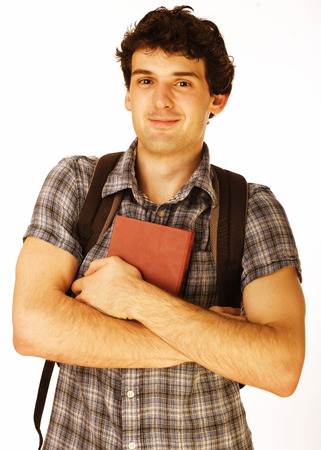 young handsome men isolated with book and backpack on whiteの写真素材