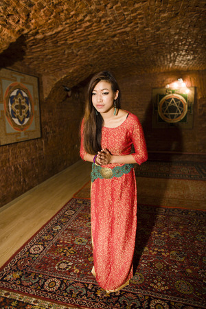 beauty asian girl greeting in spa salon smilingの写真素材
