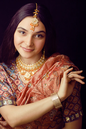 beauty sweet real indian girl in sari smilingの写真素材