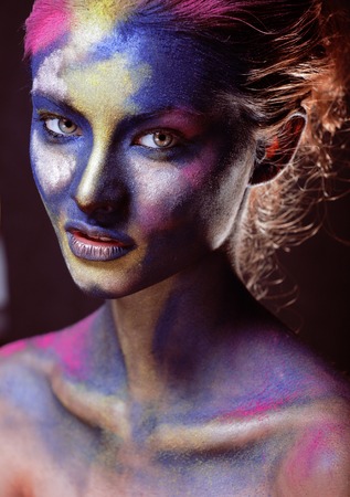beauty woman with creative make up like Holy celebration in India closeupの写真素材