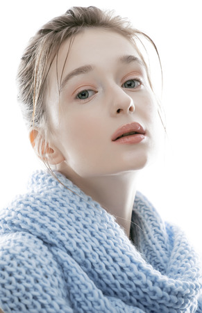 young real blond woman in scarf, spring warmの写真素材