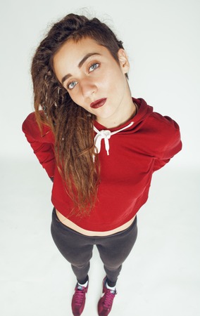 real caucasian woman with dreadlocks hairstyle funny cheerful faces on white backgroundの写真素材