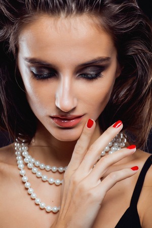 beauty young sencual woman with jewellery close up, luxury portrait of rich real girl, party makeupの写真素材