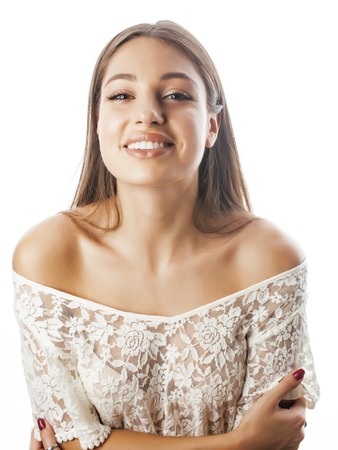 young beauty woman smiling dreaming isolated on white close upの写真素材