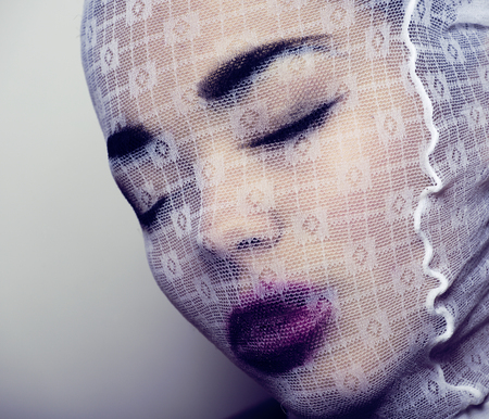 fashion robber with pantyhose on headの写真素材