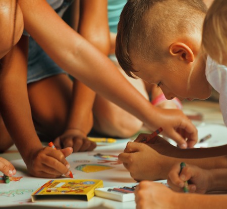 little cute boy with company painting on birthday party togetherの写真素材
