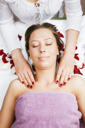 stock photo attractive lady getting spa treatment in salon, massage doctor smiling care pretty cureの写真素材