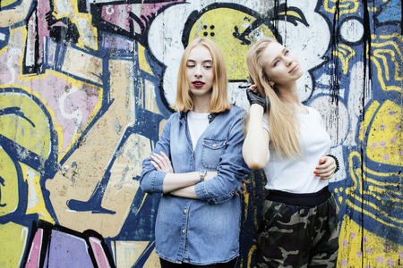 two blonde real teenage girl hanging out at summer together best friends, lifestyle people concept problem ageの写真素材
