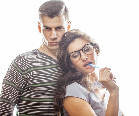 love affair at work, young pretty couple, man and woman together isolated on white background, office clerk, secretary seduces boss, lifestyle concept close upの写真素材