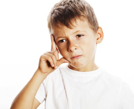 litlle cute blond boy tired sad isolated on white background close up thinking, looking like having ideaの写真素材