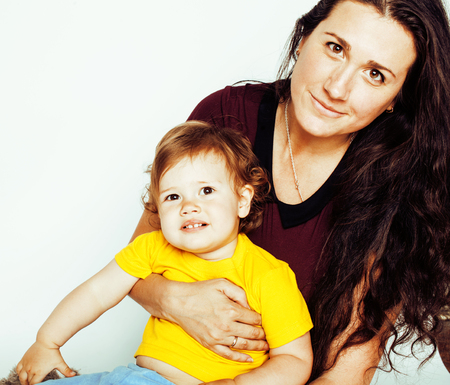 bright picture of hugging mother and daughter happy together, smiling stylish family. lifestyle people concept close upの写真素材