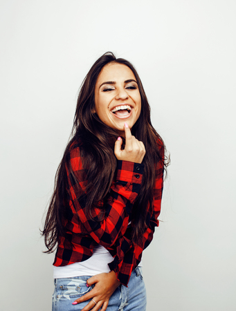young happy smiling latin american teenage girl emotional posing on white background, lifestyle people concept close upの写真素材