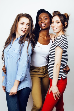 diverse multi nation girls group, teenage friends company cheerful having fun, happy smiling, cute posing isolated on white background, lifestyle people concept, african-american and caucasian close upの写真素材