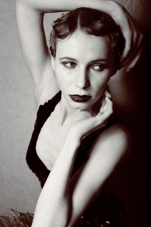 beauty blond woman in studio black and white, old-fashioned hollywood style close upの写真素材