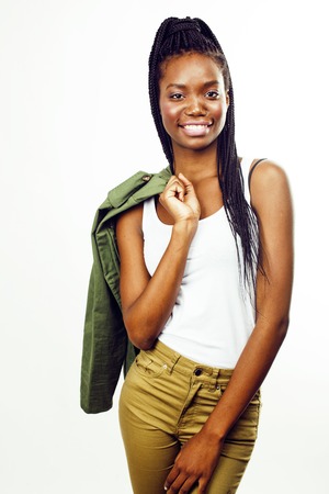 young pretty african-american girl posing cheerful emotional on white background isolated, lifestyle people conceptの写真素材