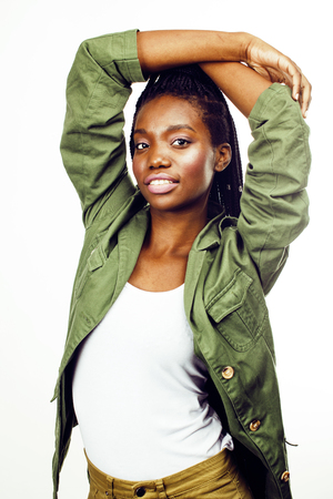 young pretty african-american girl posing cheerful emotional on white background isolated, lifestyle people conceptの写真素材