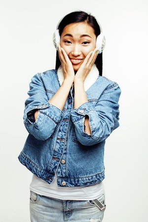 young pretty asian woman posing cheerful emotional isolated on white background, lifestyle people conceptの写真素材