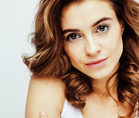 young sweet brunette woman close up isolated on white background, perfect pure innocense beautiful, spa real people conceptの写真素材