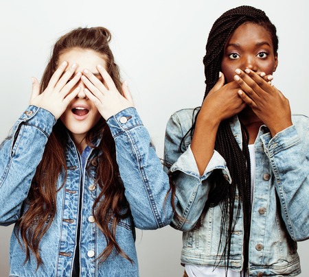 diverse multi nation girls group, teenage friends company cheerful having fun, happy smiling, cute posing isolated on white background, lifestyle people concept, african-american and caucasianの写真素材