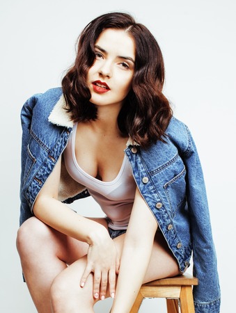 young pretty stylish hipster girl posing emotional isolated on white background happy smiling cool smile, lifestyle people conceptの写真素材