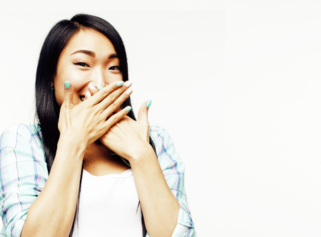 young pretty asian woman posing cheerful emotional isolated on white background, lifestyle people...