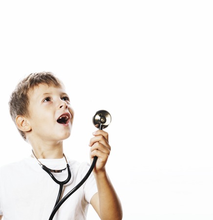 little cute boy with stethoscope playing like adult profession dの写真素材