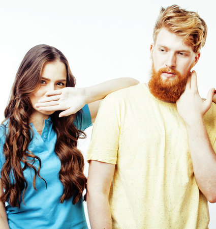 young pretty teenage couple, hipster guy with his girlfriend happy smiling and hugging isolated on white background, lifestyle people conceptの写真素材