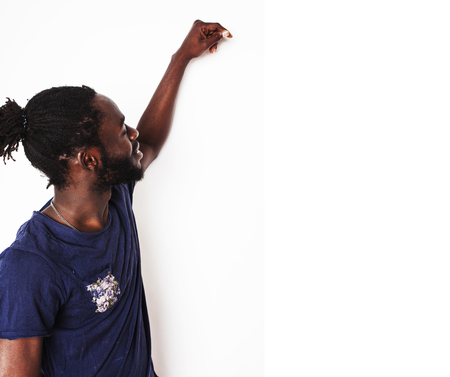 young handsome afro american boy, stylish hipster gesturing emotional isolated on white background smiling, lifestyle people conceptの写真素材