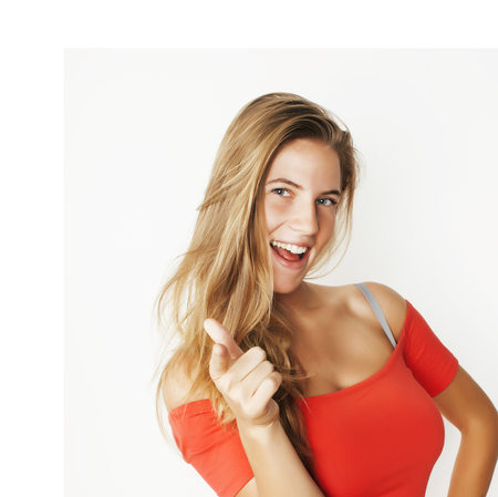 young pretty stylish brunette hipster girl posing emotional isolated on white background happy smiling cool smile, lifestyle people conceptの写真素材