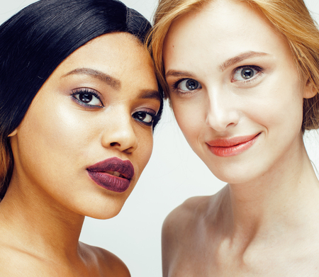 different nation woman: african-american, caucasian together isolated on white background happy smiling, diverse type on skin, lifestyle people conceptの写真素材