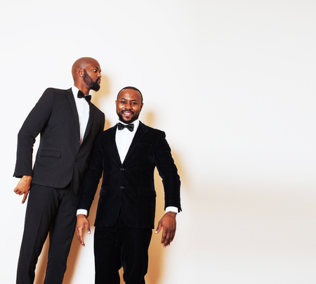 two afro-american businessmen in black suits emotional posing, gの写真素材