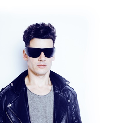 young handsome modern man in sunglasses like robot, lifestyle fashion style people conceptの写真素材