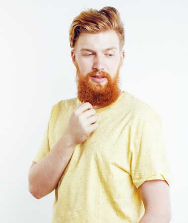 portrait of young bearded hipster guy smiling on white background close up isolated, lifestyle real modern people conceptの写真素材