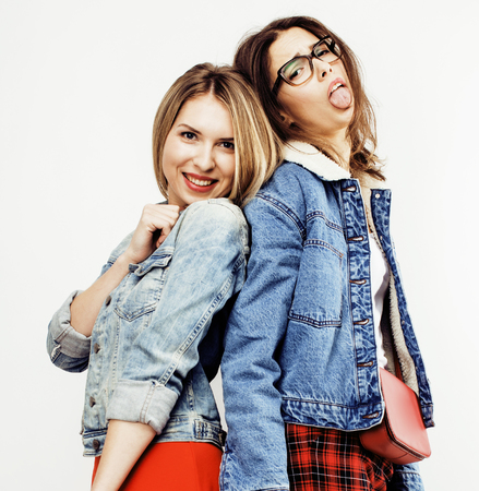 best friends teenage girls together having fun, posing emotional on white background, besties happy smiling, lifestyle people concept close upの写真素材
