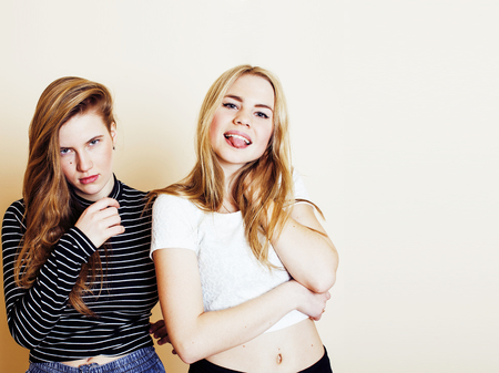 best friends teenage girls together having fun, posing emotionalの写真素材