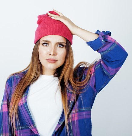 young pretty teenage hipster girl posing emotional happy smiling