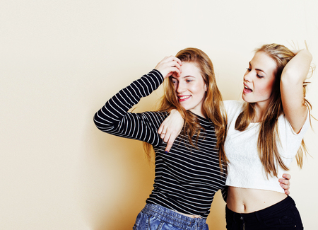 best friends teenage girls together having fun, posing emotionalの写真素材
