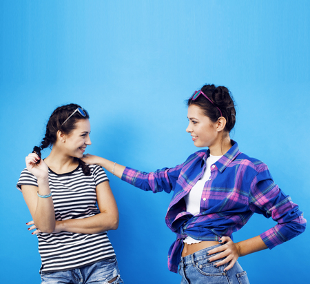 best friends teenage school girls together having fun, posing emの写真素材