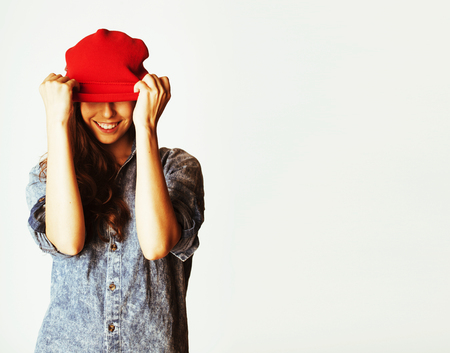 young cheerful brunette teenage girl on white backgroundの写真素材